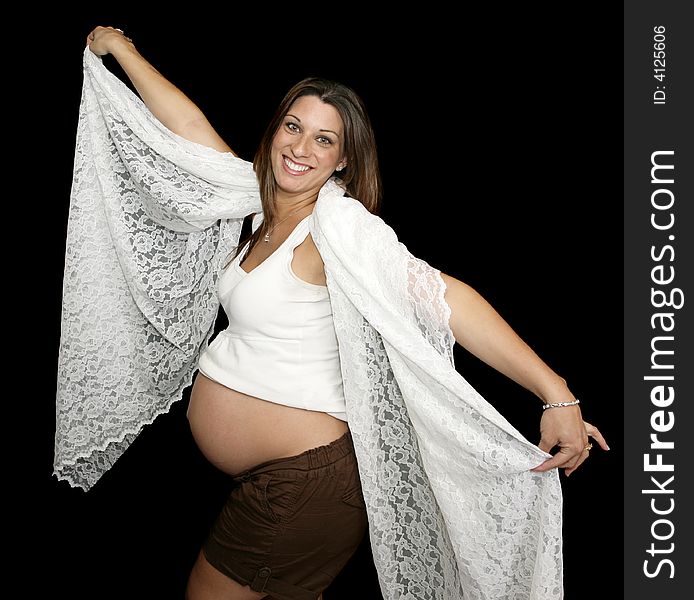 Beautiful expectant mother thrilled to be pregnant. Beautiful expectant mother thrilled to be pregnant.