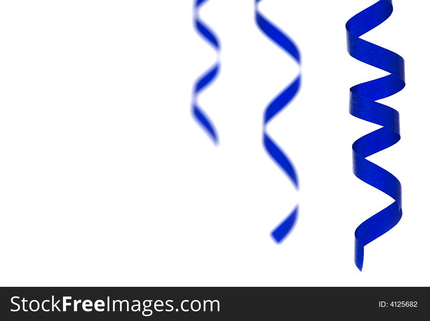 Blue streamers on white background