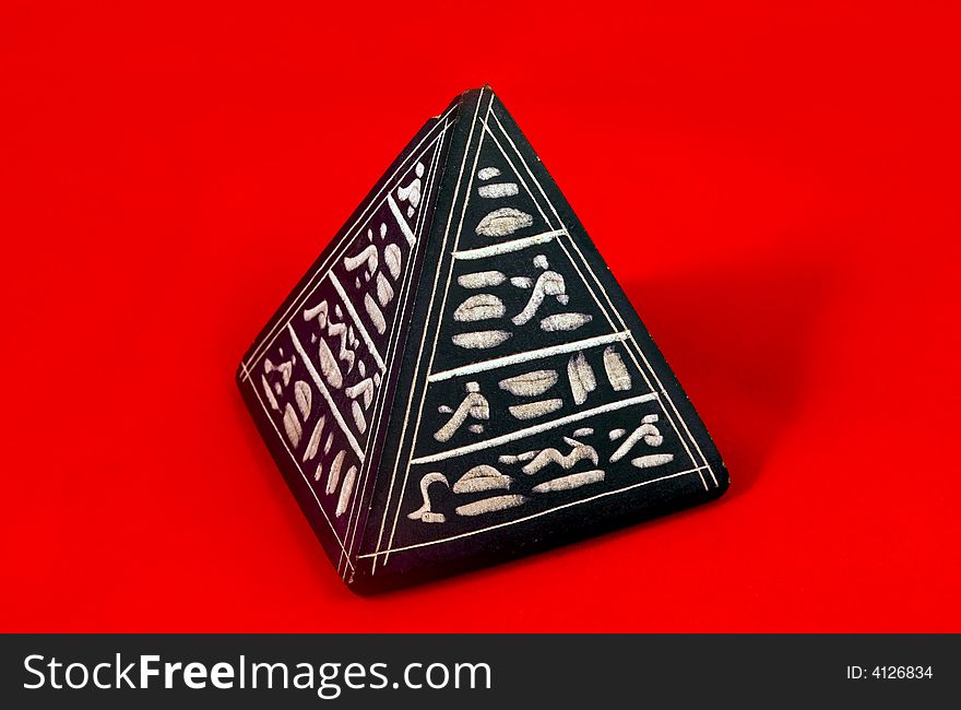 Black pyramid with egyptian hyerogliphs
