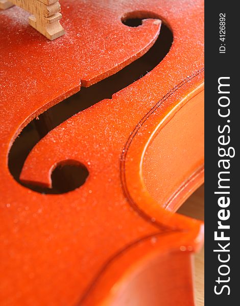 Close up on f hole of a violin. Close up on f hole of a violin