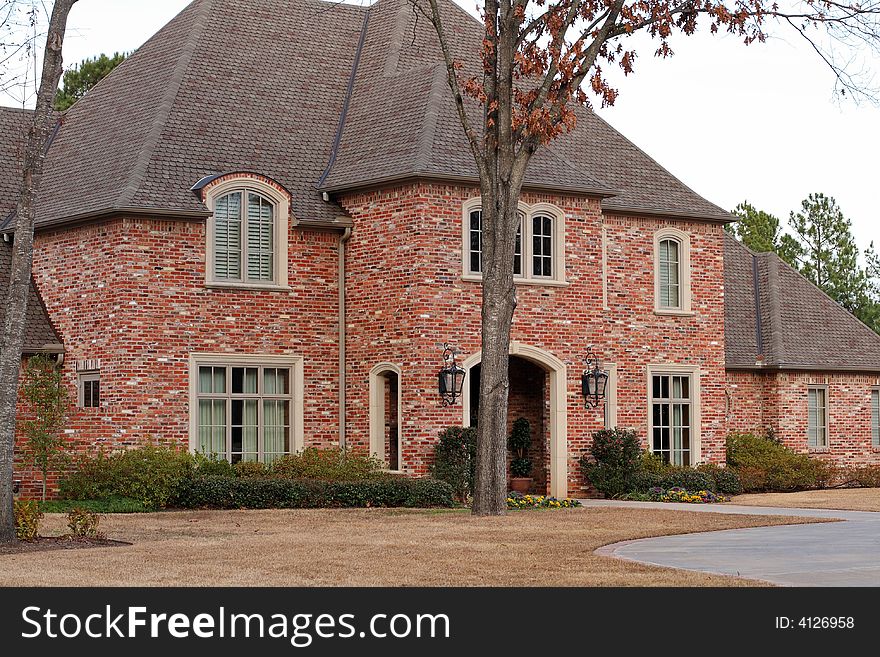 Palatial two story brick house in an urban subdivision. Palatial two story brick house in an urban subdivision