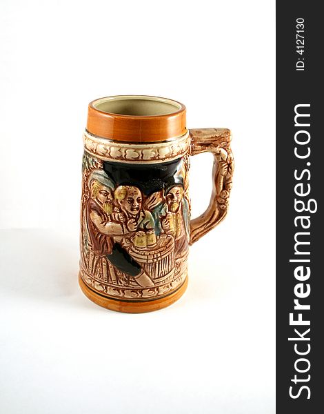 Vintage ceramic beer mug, decorated by bas-relief. Vintage ceramic beer mug, decorated by bas-relief