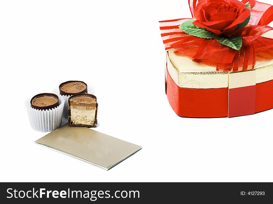 Three candies with card and heart shape box with rose