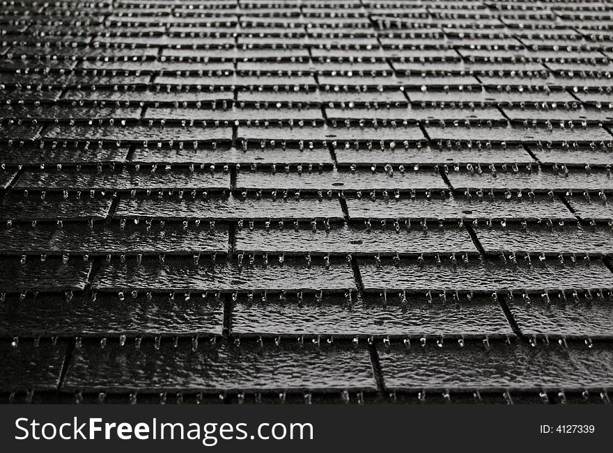 Pattern of icicles formed on roof shingles. Pattern of icicles formed on roof shingles