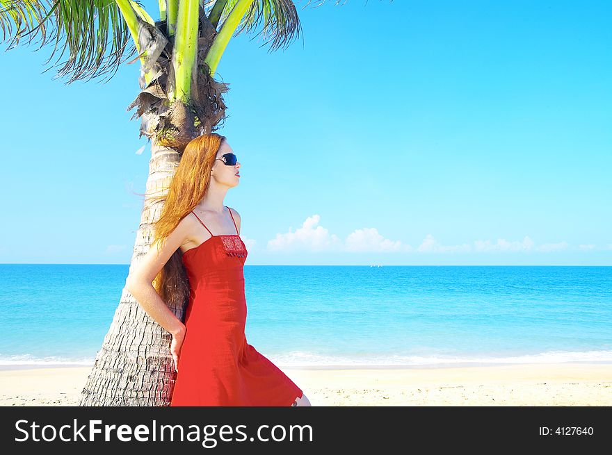 Portrait of a young red-hair female in summer environment. Portrait of a young red-hair female in summer environment