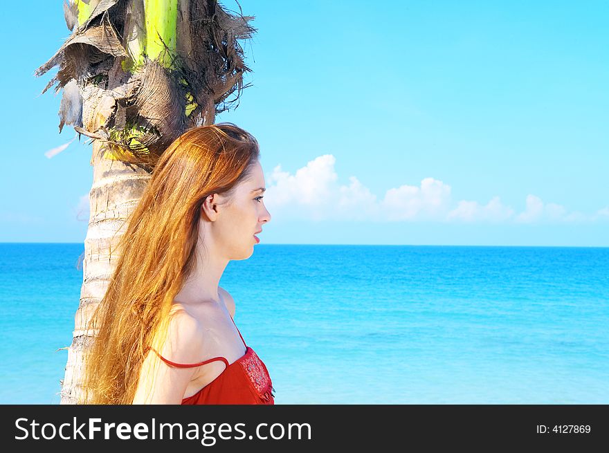 Portrait of a young red-hair female in summer environment. Portrait of a young red-hair female in summer environment