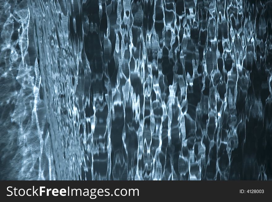 Abstract water textured background close-up. Abstract water textured background close-up