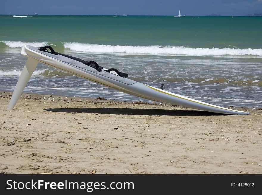 Windsurfing board base at the beach close-up. Windsurfing board base at the beach close-up.