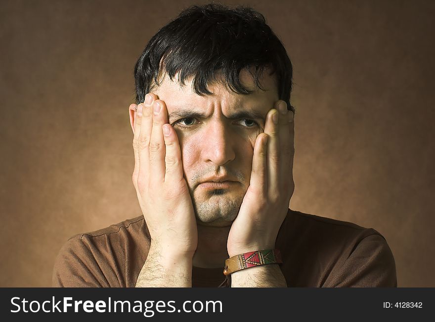 Portrait sad men on a dark background