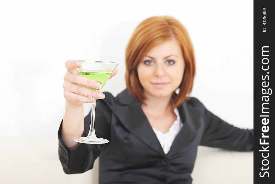 Young business woman with martini glass