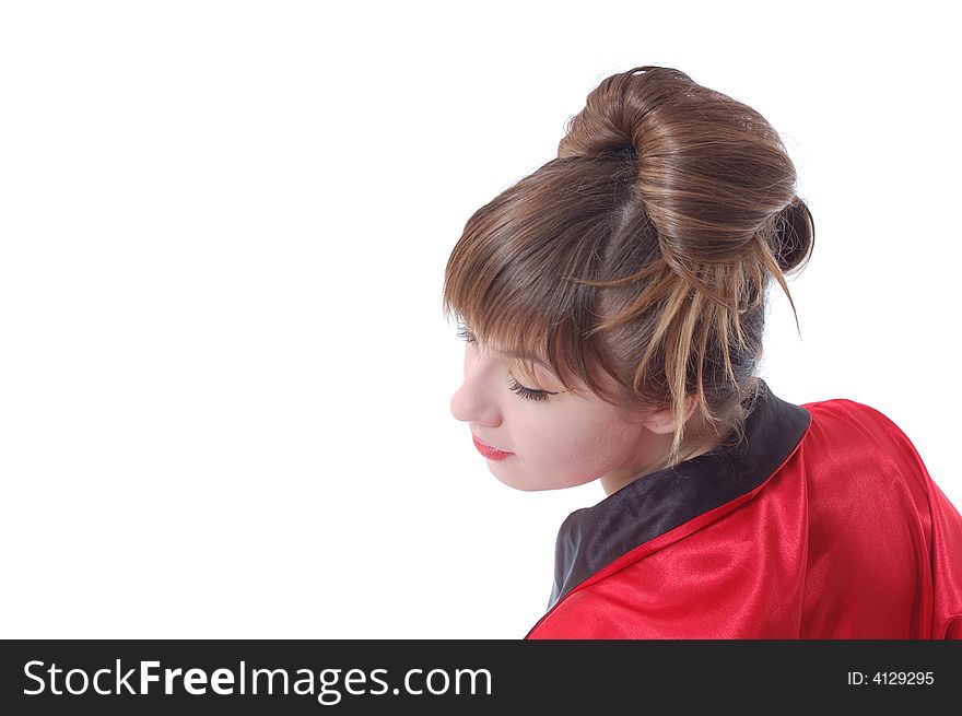 Attractive girl in red kimono stay to turn the head backward. isolated over white. whith copyspace. Attractive girl in red kimono stay to turn the head backward. isolated over white. whith copyspace