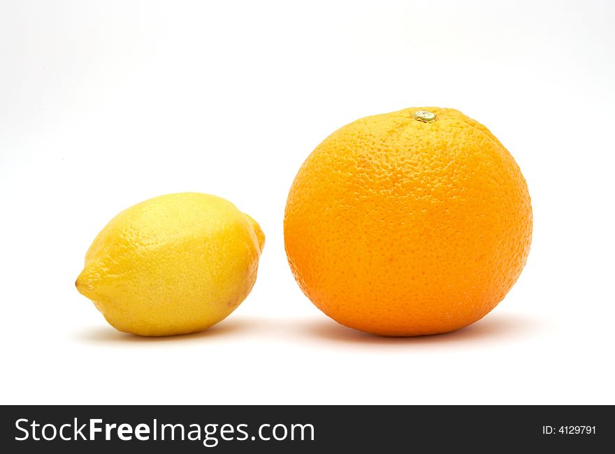 Fresh orange and lemon isolated on white background