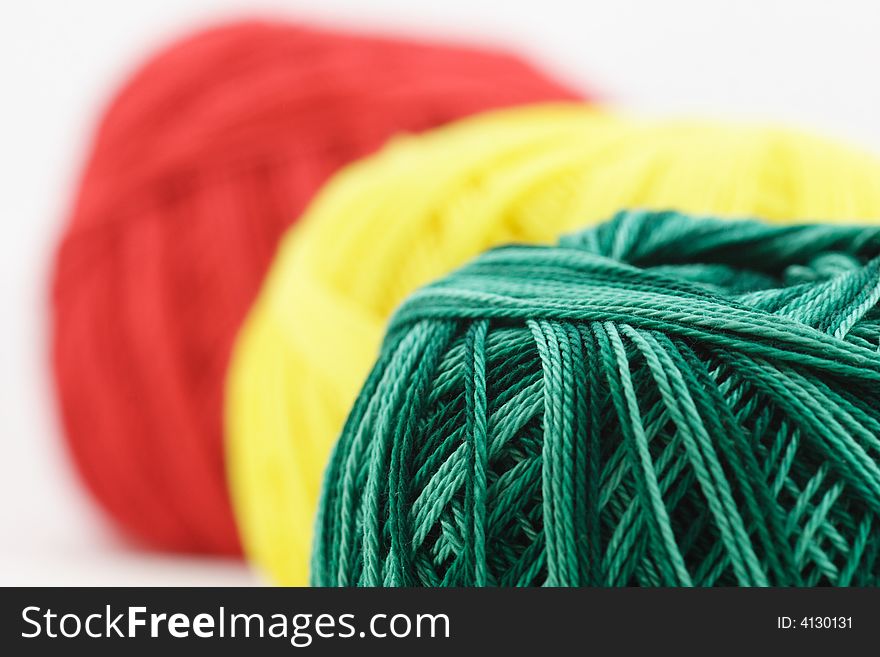Photo of red, yellow, and green cottons. Photo of red, yellow, and green cottons.