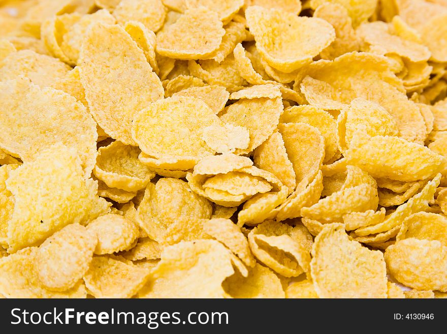 Many corn flakes on macro shot. Many corn flakes on macro shot