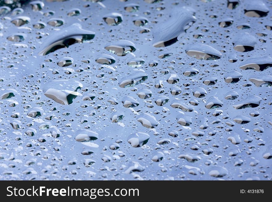 Macro Shot of Water Drops on Glass