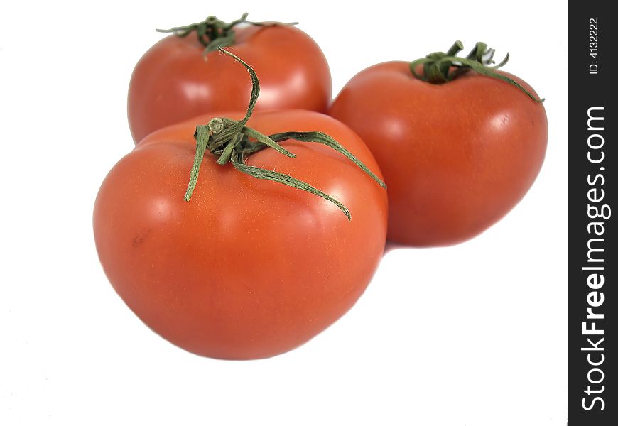 Tomatoes isolated on a white background. Close-up.