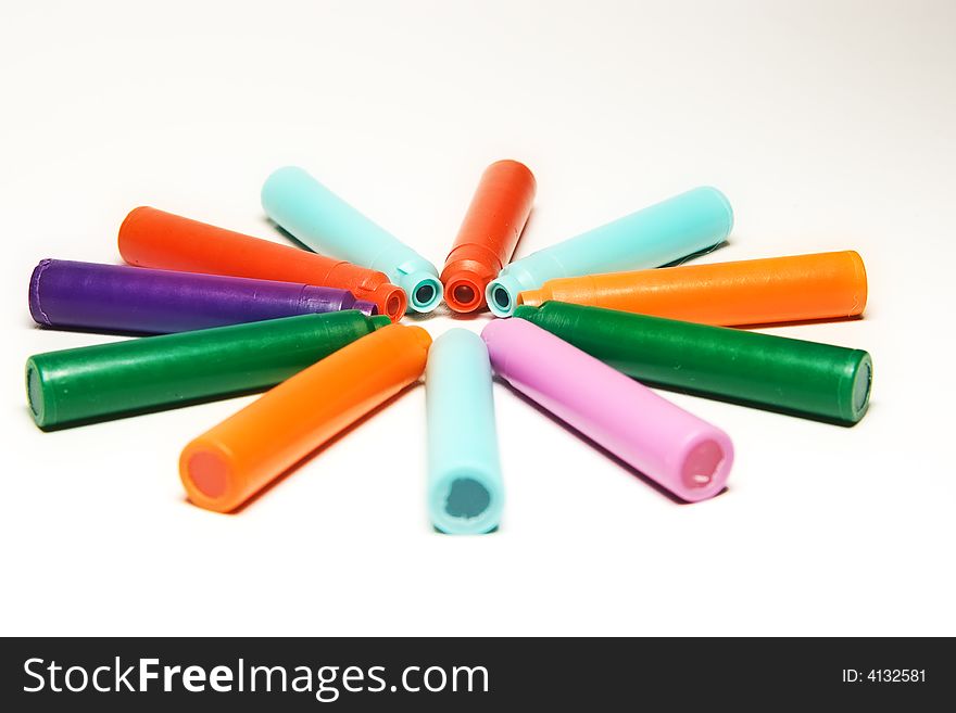Color ink cups on white background