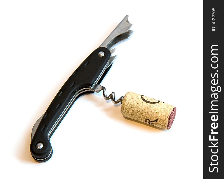 Black corkscrew with a cork in it, isolated on white