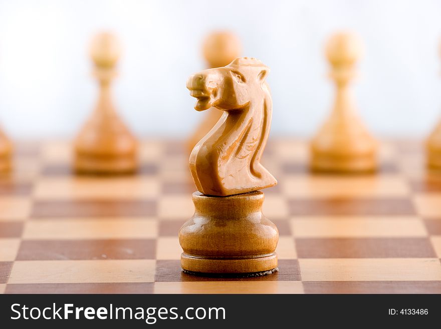 Chess figure on a chess board