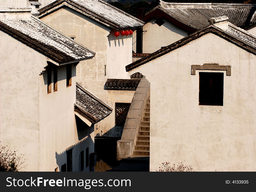 Black tiles,fastigium,white wall are chracteristic of traditional house of eastern china. Black tiles,fastigium,white wall are chracteristic of traditional house of eastern china