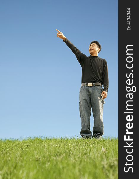 Shot of a man pointing out representing pointing at future target or goal. with copyspace. Shot of a man pointing out representing pointing at future target or goal. with copyspace