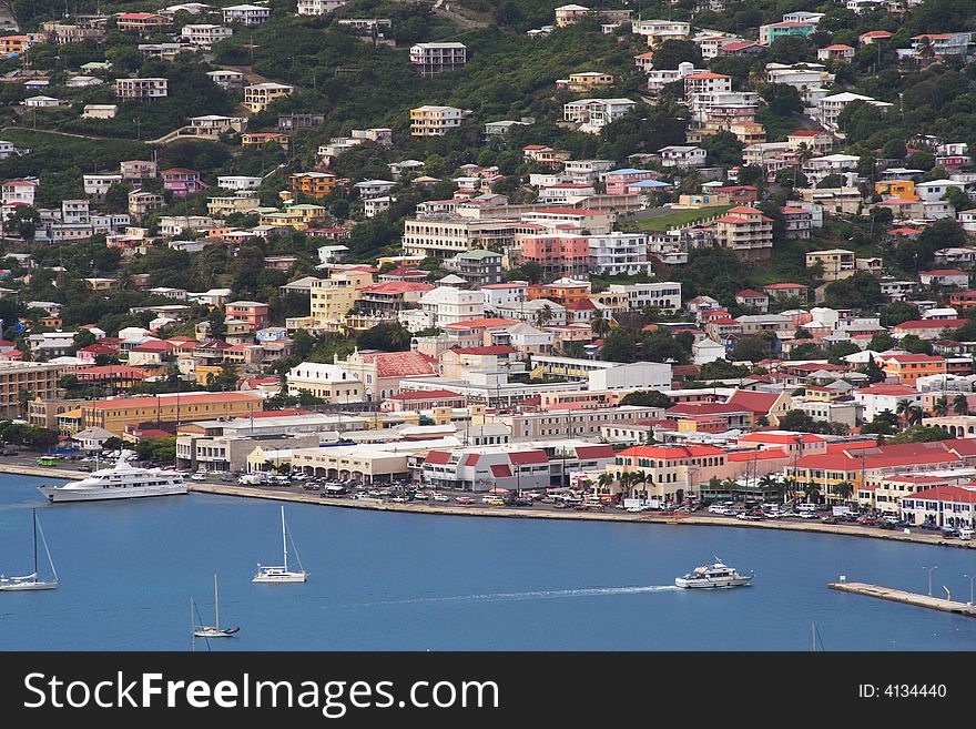 Tropical houses on hill overlooking harbor. St Thomas US Virgin Islands