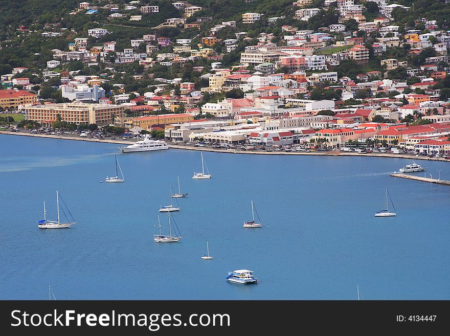 Tropical houses on hill overlooking harbor. St Thomas US Virgin Islands