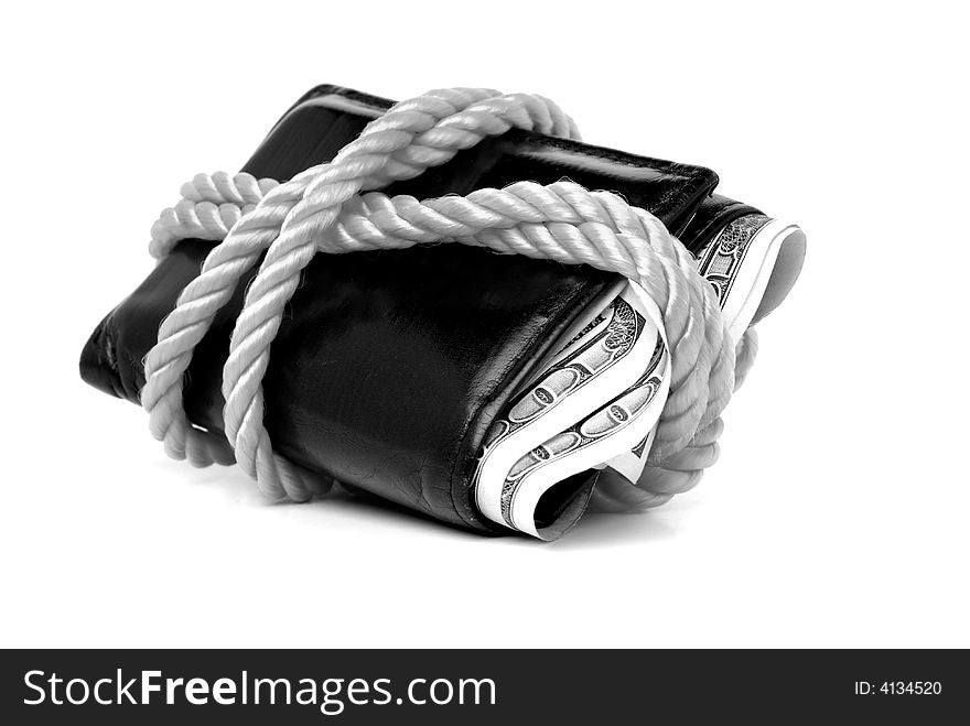 Closeup of hundred dollar bills in bulging wallet tied with rope. Closeup of hundred dollar bills in bulging wallet tied with rope