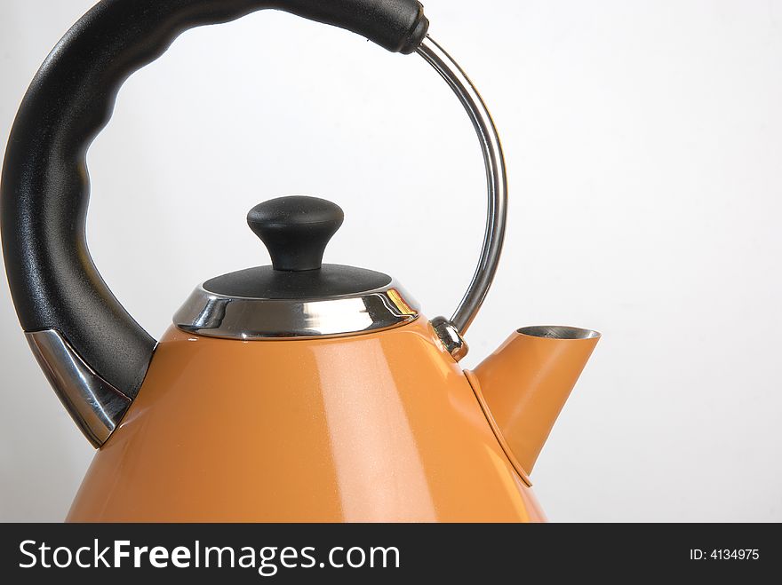 Modern electric power orange kettle. Modern electric power orange kettle