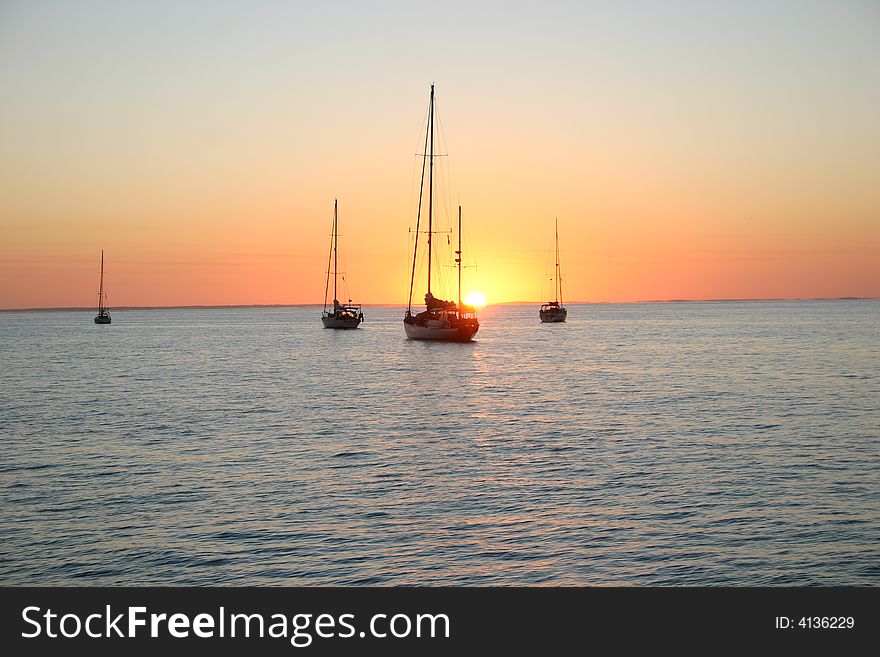 Sailboats at dawn