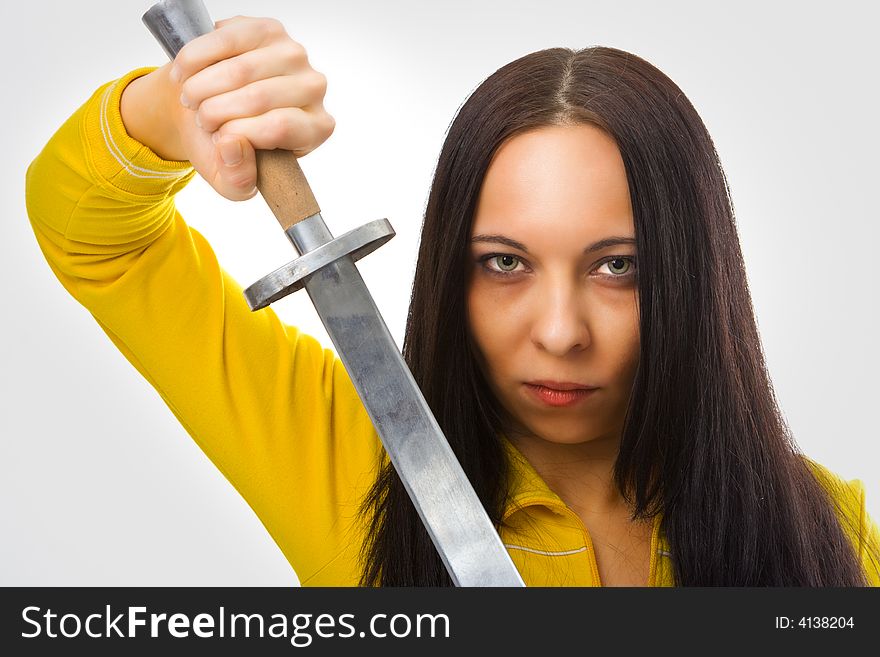 Woman in yellow with sword. Woman in yellow with sword