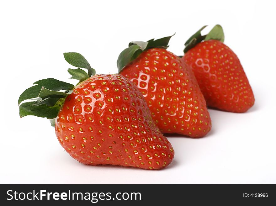 Three sweet strawberries close shot