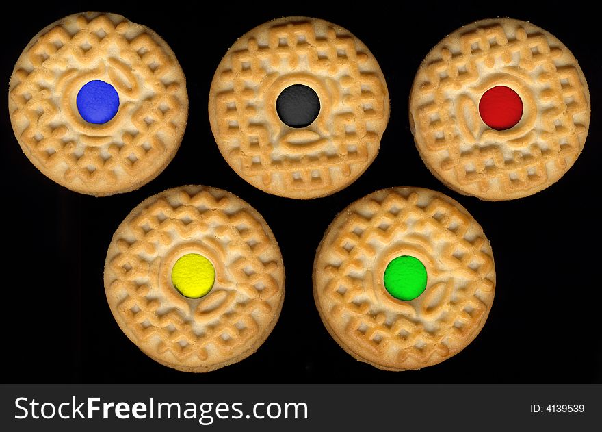 Cookies on black background mimic olimpic rings. Cookies on black background mimic olimpic rings