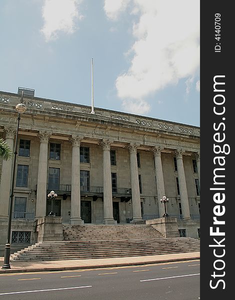 Across the road lies the parliament house. Across the road lies the parliament house