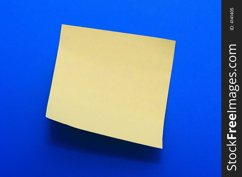 Yellow note paper on a blue background