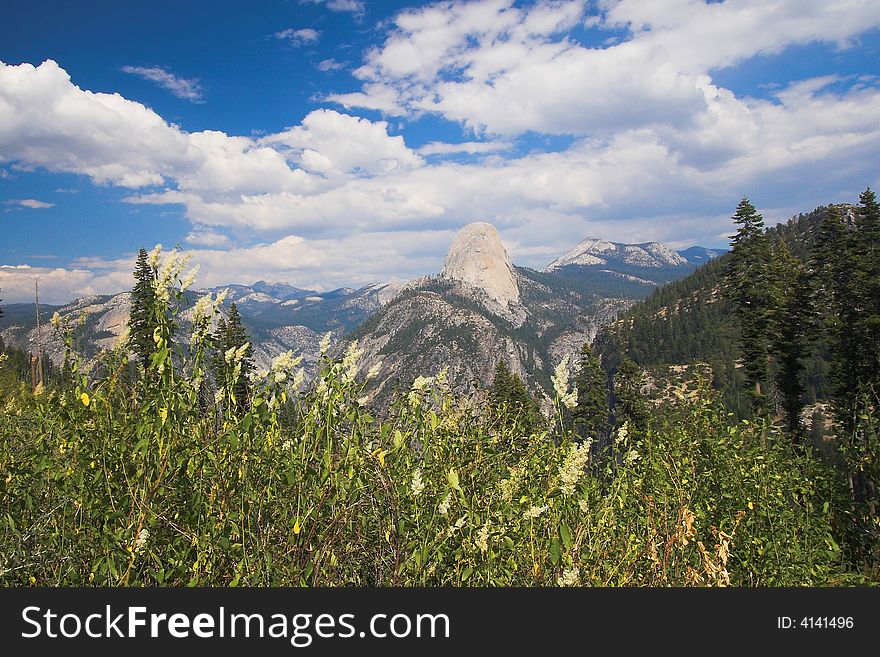 Scenic view of Half Dome in Yosemite, California, from Panorama trail. Scenic view of Half Dome in Yosemite, California, from Panorama trail.