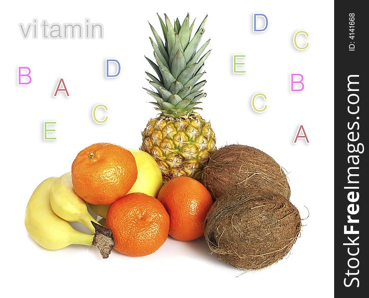 Tropical fruit and vitamins with white background.