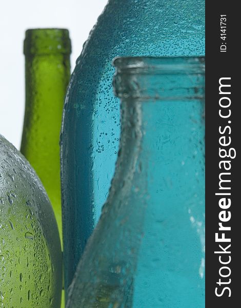 Composition from the transparent color bottles, photographed close up. Composition from the transparent color bottles, photographed close up.