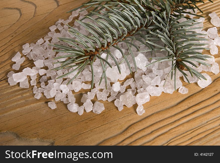 Pine bath items. sea salt with fresh branch on the old wood. Pine bath items. sea salt with fresh branch on the old wood