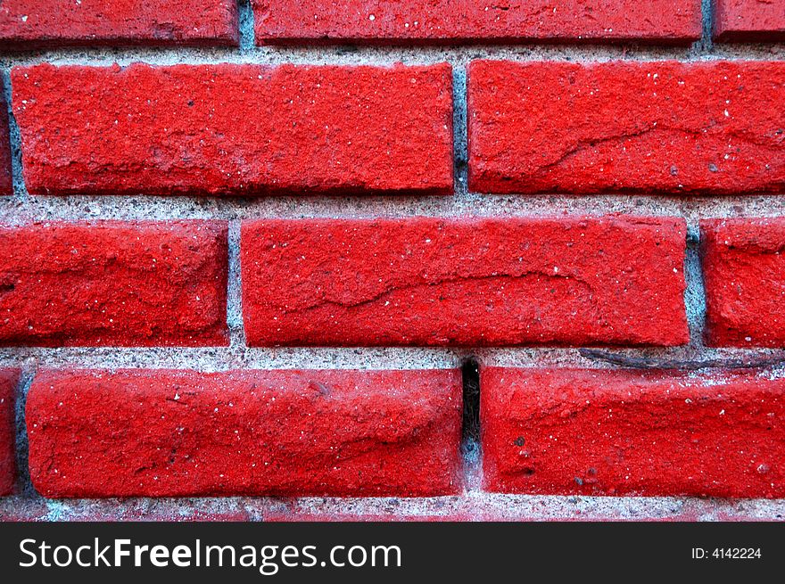 Detail shot of an old red brick wall