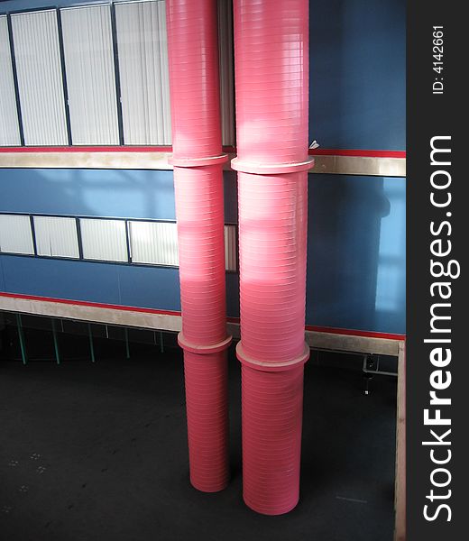 Pink tubes from within a university building