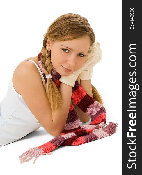 Beauty lying on white in scarf and gloves isolated. Beauty lying on white in scarf and gloves isolated