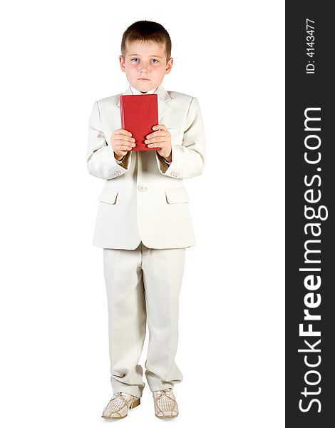 Well-dressed boy hold red book. Isolated on white. Well-dressed boy hold red book. Isolated on white