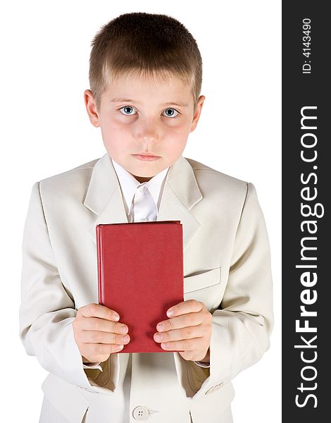 Well-dressed boy hold in hands red book. Isolated on white. Well-dressed boy hold in hands red book. Isolated on white