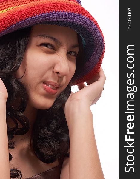 Funny girl wearing a hat on a white background