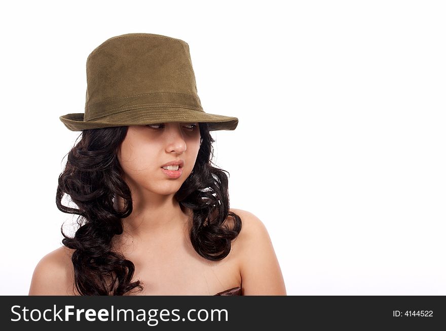 Attractive female wearing a green hat - sneering. Attractive female wearing a green hat - sneering