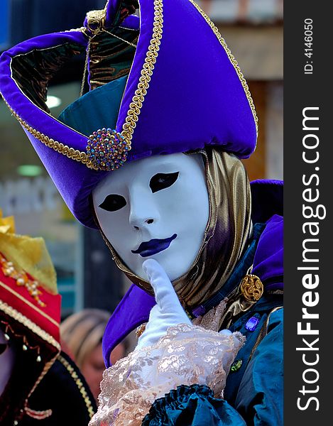 France. Paris: Celebration of the grape harvest of Montmartre. Beautiful and colorful venetian mask