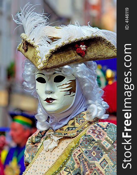 France. Paris: Celebration of the grape harvest of Montmartre. Beautiful and colorful venetian mask