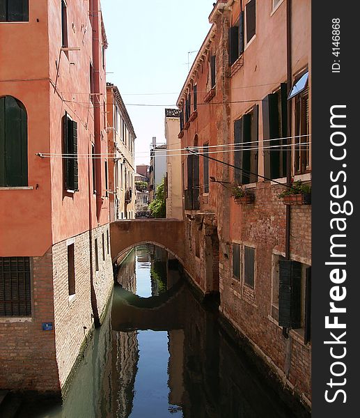 A pretty and colourful canal in Venice