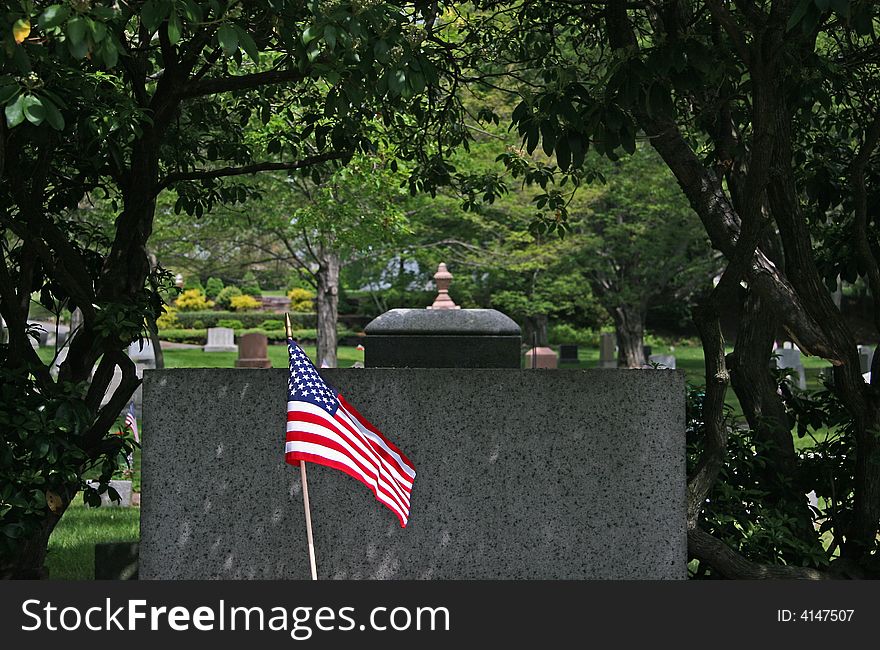 US flag and tombstons on Memorial Day